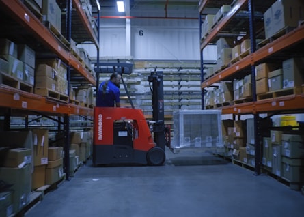 Worker on forklift